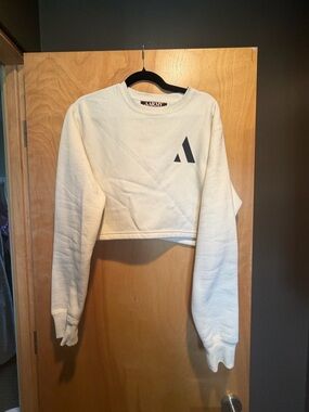 Cropped Ivory Sweatshirt with Minimal Logo - Women's Crop Top